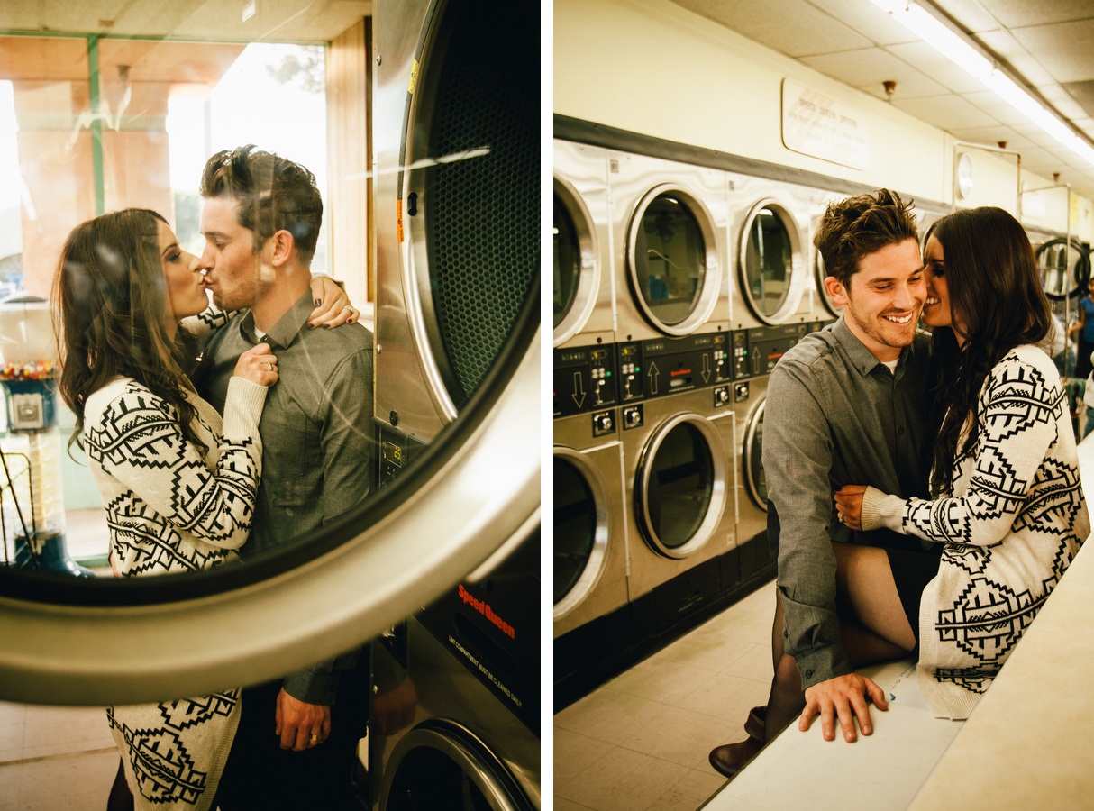 Couple in love taking engagement photos in laundrymat 