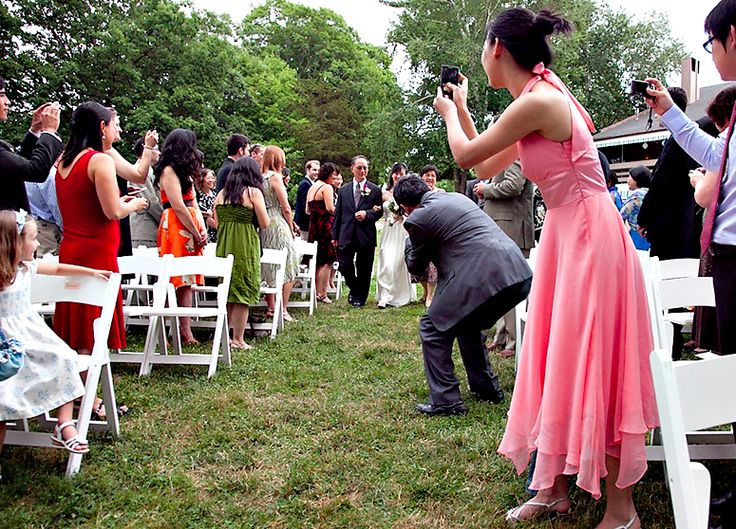 guest blocking photographer shot at wedding 