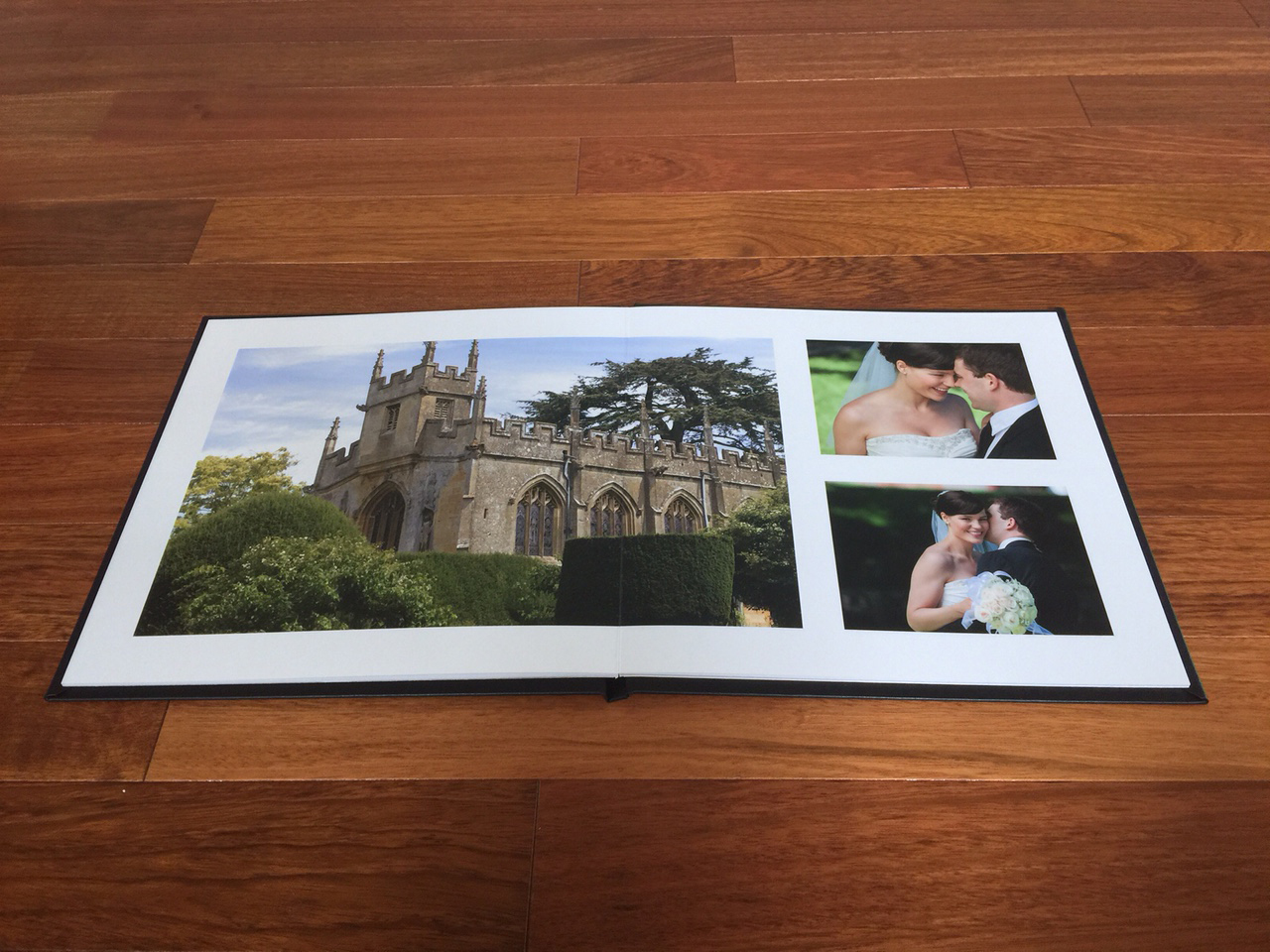 Pure Photo Lay flat wedding album with panoramic spreads black leather cover