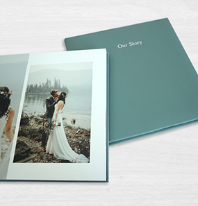 Wedding photo album with a cover titled "Our Story" featuring a couple's wedding photos on an open page.